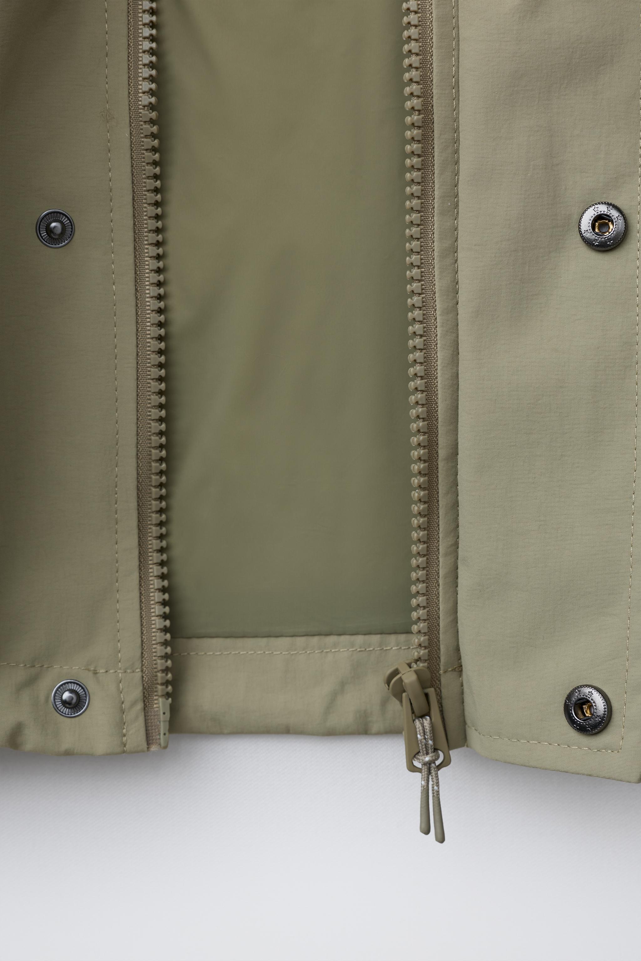 PARKA COURTE À POCHES